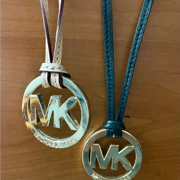 Michael Kors Accessories - Michael Kors Black or Beige Leather straps & Gold Logo charm. Set of two.